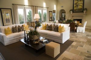 Furnished living room with throw pillows on couch in Gilbert AZ